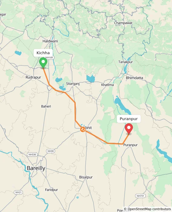 Route map showing distance and travel time from Kichha, India to Puranpur, India