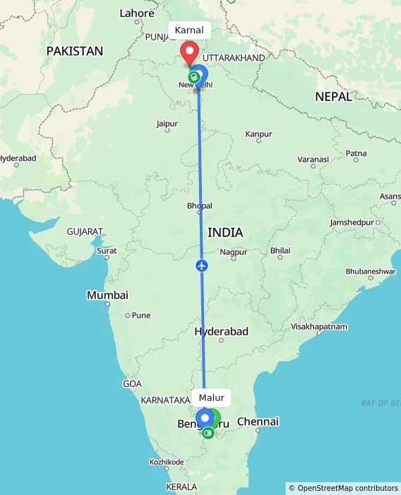 Route map showing distance and travel time from Malur, India to Karnal, India