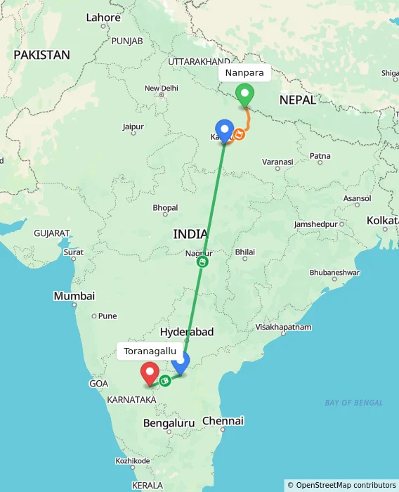 Route map showing distance and travel time from Nanpara, India to Toranagallu, India