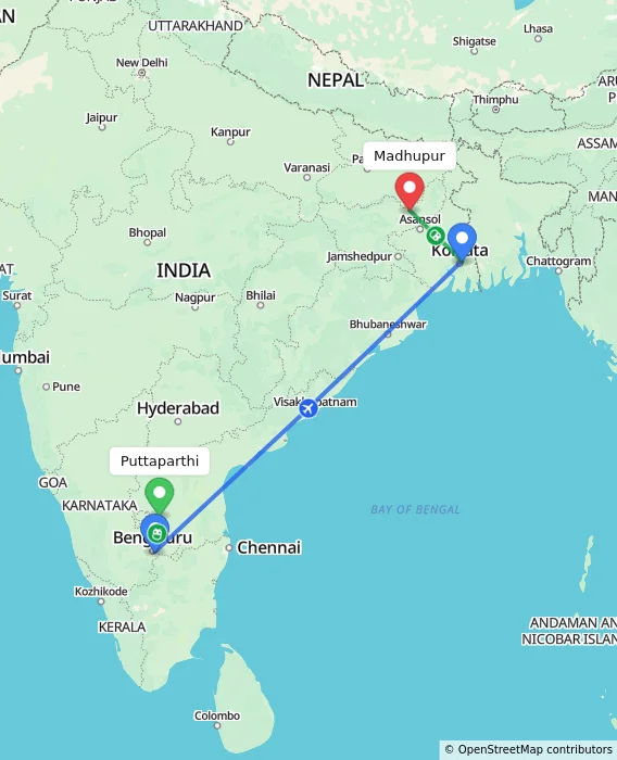 Route map showing distance and travel time from Puttaparthi, India to Madhupur, India