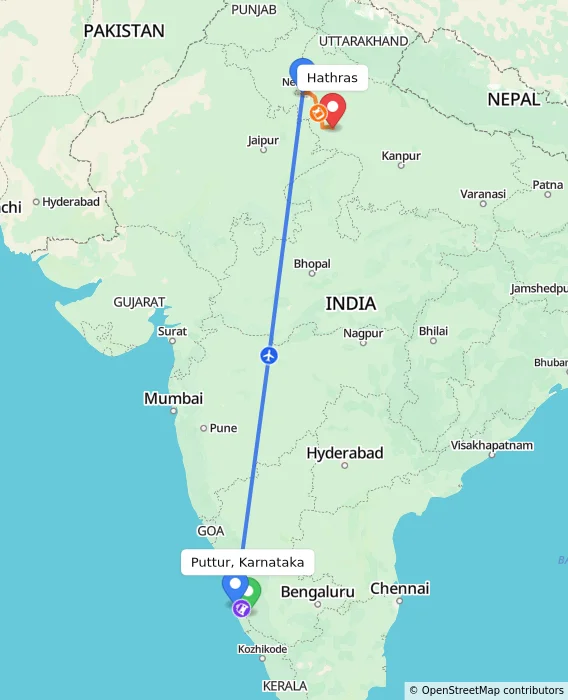 Route map showing distance and travel time from Puttur, Karnataka, India to Hathras, India
