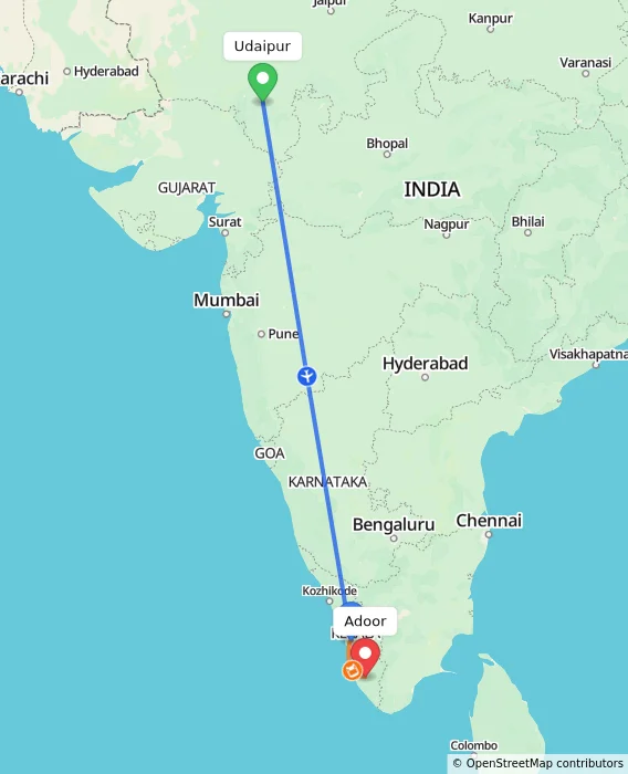 Route map showing distance and travel time from Udaipur, India to Adoor, India