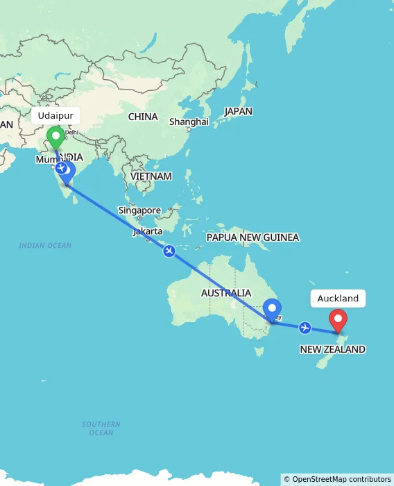 Route map showing distance and travel time from Udaipur, India to Auckland, New Zealand