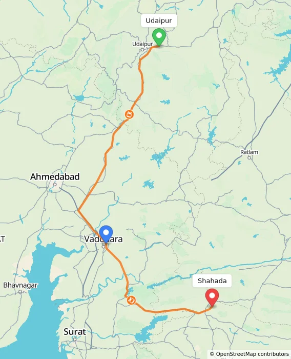 Route map showing distance and travel time from Udaipur, India to Shahada, India